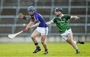10 April 2014; Liam Fahey, Tipperary, in action against Daragh Fanning, Limerick. Electric Ireland Munster GAA Hurling Minor Championship, Quarter-Final, Limerick v Tipperary. Gaelic Grounds, Limerick. Picture credit: Diarmuid Greene / SPORTSFILE