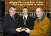 7 December 2005; Roy O'Donovan Cork City, who was presented with the eircom / Soccer Writers Association of Ireland Player of the Month award for November by Padraig Corkery,right, Head of Sponsorship with eircom and Cork City Manager Damien Richardson. Baggot Street, Dublin. Picture credit: Matt Browne / SPORTSFILE
