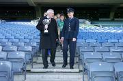 12 December 2005; An Taoiseach Bertie Ahern TD, was in Croke Park for a &quot;triple header&quot; with the CCIA, the Camogie Associations 3rd Level council. The day included the draws for the Ashbourne and Purcell Cup competitions, the launch of the associations &quot;Women in Sport&quot; project and the presentation of the first national camogie Bursary awards. Pictured with An Taoiseach Bertie Ahern, TD, is Garda Aoife Cullen, who is stationed in Pearse St, Dublin, and who plays with the Garda College, who are in their first year in the competition. Croke Park, Dublin. Picture credit: Brendan Moran / SPORTSFILE
