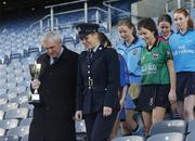 12 December 2005; An Taoiseach Bertie Ahern TD, was in Croke Park for a &quot;triple header&quot; with the CCIA, the Camogie Associations 3rd Level council. The day included the draws for the Ashbourne and Purcell Cup competitions, the launch of the associations &quot;Women in Sport&quot; project and the presentation of the first national camogie Bursary awards. Pictured with An Taoiseach Bertie Ahern, TD, is Garda Aoife Cullen, who is stationed in Pearse St, Dublin, and who plays with the Garda College, who are in their first year in the competition, followed by Sarah Murreann, Laura Lavery, Queens, Lizzy Flynn, WIT and Grace McNamara, IT Tralee. Croke Park, Dublin. Picture credit: Pat Murphy / SPORTSFILE