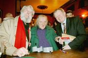 13 December 2005; Con Houlihan with Ronnie Drew and publican Charlie Chawke  at the launch of his latest book 'A Harvest', published by Boglark Press at 14.95 euro, in Mulligan's of Poolbeg Street, Dublin. Picture credit: Ray McManus / SPORTSFILE