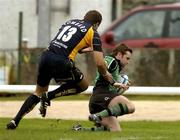 17 December 2005; Conor McPhilips, Connacht, goes over for his try despite the tackle of Thomas Lombard, Worcester. European Challenge Cup 2005-2006, Pool 5, Conancht v Worcester, Sportsground, Galway. Picture credit: Matt Browne / SPORTSFILE