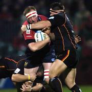17 December 2005; Mick O'Driscoll, Munster, is tackled by Gethin Robinson, Newport Gwent Dragons. Heineken Cup 2005-2006, Pool 1, Round 4, Munster v Newport Gwent Dragons, Thomond Park, Limerick. Picture credit: Damien Eagers / SPORTSFILE