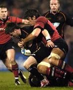 17 December 2005; Ceri Sweeney, Newport Gwent Dragons, is tackled by Donnacha O'Callaghan, Munster. Heineken Cup 2005-2006, Pool 1, Round 4, Munster v Newport Gwent Dragons, Thomond Park, Limerick. Picture credit: Damien Eagers / SPORTSFILE