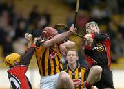 18 December 2005; Andrew McGovern, left, The Underdogs, takes the ball from John Tennyson, Kilkenny and team-mate Nicky Jacob. TG4 Challenge Game, Kilkenny v The Underdogs, Nowlan Park, Kilkenny. Picture credit: Matt Browne / SPORTSFILE