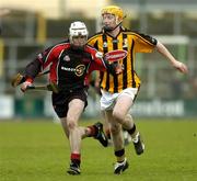18 December 2005; Michael Grace, The Underdogs, in action against Richie Power, Kilkenny. TG4 Challenge Game, Kilkenny v The Underdogs, Nowlan Park, Kilkenny. Picture credit: Matt Browne / SPORTSFILE
