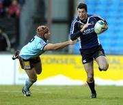 17 December 2005; Rob Kearney, Leinster, is tackled by Petrilli Augusto, Bourgoin. Heineken Cup 2005-2006, Pool 5, Round 4, Bourgoin v Leinster, Stade Pierre Rajon, Bourgoin-Jallieu, France. Picture credit: Brian Lawless / SPORTSFILE