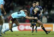 17 December 2005; Rob Kearney, Leinster, is tackled by David Janin, Bourgoin. Heineken Cup 2005-2006, Pool 5, Round 4, Bourgoin v Leinster, Stade Pierre Rajon, Bourgoin-Jallieu, France. Picture credit: Brian Lawless / SPORTSFILE