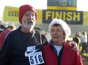 25 December 2005; 'Compeditors' John and Mary Burke, from Rathfarnham, Dublin, after one of the many Goal Miles during the Annual Goal Mile run. Belfield, Dublin. Picture credit: Ray McManus / SPORTSFILE
