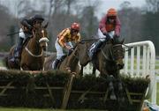 26 December 2005; Clear Riposte, with Davy Russell up, clear the last on their way to winning Durkan New Homes Juvenile Hurdle from Artist's Muse, Davy Russell up, centre, who finished second and third placed Dreux, Niall Madden, left. Leopardstown Racecourse, Co. Dublin. Picture credit: Pat Murphy / SPORTSFILE