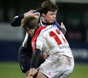 26 December 2005; Brian O'Driscoll, Leinster, who came on as a second half substitude escapes a tackle by Ulster's Andrew Trimble. Celtic League 2005-2006, Group A, Ulster v Leinster, Ravenhill, Belfast. Picture credit: Oliver McVeigh / SPORTSFILE