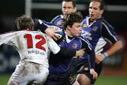 26 December 2005; Brian O'Driscoll, Leinster, who came on as a second half substitude escapes a tackle by Ulster's Andrew Trimble. Celtic League 2005-2006, Group A, Ulster v Leinster, Ravenhill, Belfast. Picture credit: Oliver McVeigh / SPORTSFILE