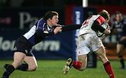 26 December 2005; Brian O'Driscoll, Leinster, who came on as a second half substitude, fails to hold Ulster's Andrew Trimble. Celtic League 2005-2006, Group A, Ulster v Leinster, Ravenhill, Belfast. Picture credit: Oliver McVeigh / SPORTSFILE