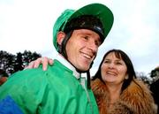 27 December 2005; Jockey John Cullen is congratulated by Thersea Burke after winning the Paddy Power Steeplechase. Leopardstown Racecourse, Co. Dublin. Picture credit: David Maher / SPORTSFILE