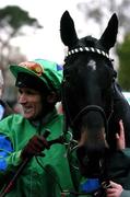 27 December 2005; Jockey John Cullen with his mount Black Apalachi celebrates after winning the Paddy Power Steeplechase. Leopardstown Racecourse, Co. Dublin. Picture credit: David Maher / SPORTSFILE