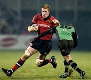 27 December 2005; Paul O'Connell, Munster, is tackled by Paul Warwick, Connacht. Celtic League 2005-2006, Group A, Munster v Connacht, Thomond Park, Limerick. Picture credit: Brendan Moran / SPORTSFILE