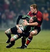 27 December 2005; Michael Swift, Connacht, is tackled by Paul O'Connell, Munster. Celtic League 2005-2006, Group A, Munster v Connacht, Thomond Park, Limerick. Picture credit: Brendan Moran / SPORTSFILE