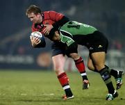 27 December 2005; Anthony Horgan, Munster, is tackled by Gavin Williams, Connacht. Celtic League 2005-2006, Group A, Munster v Connacht, Thomond Park, Limerick. Picture credit: Brendan Moran / SPORTSFILE