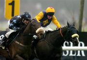 29 December 2005; Eventual winner Rocket Ship, right, with Paul Carberry up, on their way to winning the Bewleys Hotel Leeds Hurdle, from eventual second Maxxium, Johnny Murtagh up. Leopardstown Racecourse, Co. Dublin. Picture credit: Brian Lawless / SPORTSFILE