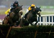 29 December 2005; Eventual winner Rocket Ship, right, with Paul Carberry up, clears the last on their way to winning the Bewleys Hotel Leeds Hurdle, from eventual second Maxxium, Johnny Murtagh up, left. Leopardstown Racecourse, Co. Dublin. Picture credit: Brian Lawless / SPORTSFILE