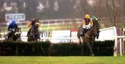 29 December 2005; Brave Inca, with Tony McCoy up, clears the last ahead of eventual 2nd, Harchibald, Paul Carberry up, second from left, eventual third, Newmill, Andrew McNamara up, right, and Macs Joy, Barry Geraghty up, left, on their way to winning the bewleyshotels.com December Festival Hurdle. Leopardstown Racecourse, Co. Dublin. Picture credit: Brian Lawless / SPORTSFILE