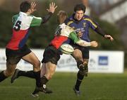 30 December 2005; Ross McCarron, Leinster A, is tackled by Fionn Carr and Matt Williams, left, Ireland U21. Challenge Game, Ireland U21 v Leinster A, Blackrock College RFC, Stradbrook Road, Dublin. Picture credit: Brian Lawless / SPORTSFILE
