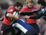 31 December 2005; Marcus Horan, Munster, is tackled by Kieran Lewis, and Shane Horgan, right, Leinster. Celtic League 2005-2006, Group A, Leinster v Munster, RDS, Dublin. Picture credit: David Maher / SPORTSFILE