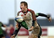 31 December 2005; Tommy Bowe, Ulster, is tackled by Michael Swift, Connacht. Celtic League 2005-2006, Group A, Connacht v Ulster, Sportsground, Galway. Picture credit: Ray McManus / SPORTSFILE