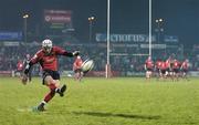 27 December 2005; Jeremy Manning, Munster, kicks a penalty as his team-mates await the rumption of the game. Celtic League 2005-2006, Group A, Munster v Connacht, Thomond Park, Limerick. Picture credit: Brendan Moran / SPORTSFILE