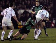 6 January 2006; David Slemen, Connacht, is tackled by Ben Breeze, Newport Gwent Dragons. Celtic League 2005-2006, Group A, Newport Gwent Dragons v Connacht, Rodney Parade, Newport, Wales. Picture credit: Tim Parfitt / SPORTSFILE *** Local Caption ***
