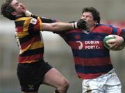 7 January 2006; Derek Keane, Clontarf, is tackled by Greg Stafford, Lansdowne. AIB All-Ireland League 2005-2006, Division 1, Lansdowne v Clontarf, Lansdowne Road, Dublin. Picture credit: Brian Lawless / SPORTSFILE