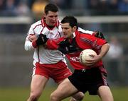 8 January 2006; Michael Walsh, Down, in action against Colin Holmes, Tyrone. Dr. McKenna Cup, First Round, Tyrone v Down, Healy Park, Omagh, Co. Tyrone. Picture credit: Pat Murphy / SPORTSFILE