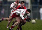 8 January 2006; Colin Holmes, Tyrone, in action against Liam Doyle, Down. Dr. McKenna Cup, First Round, Tyrone v Down, Healy Park, Omagh, Co. Tyrone. Picture credit: Pat Murphy / SPORTSFILE