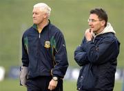 8 January 2006; Opposing managers Dr. Niall Moyna, DCU, right, and Eamonn Barry, Meath, watch the closing stages of the game. O'Byrne Cup, First Round, Meath v DCU, Pairc Tailteann, Navan, Co. Meath. Picture credit: Ray McManus / SPORTSFILE
