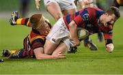 11 April 2014; David Joyce, Clontarf, is tackled by Shane Delahunt, Lansdowne. Ulster Bank League Division 1A, Lansdowne v Clontarf, Aviva Stadium, Lansdowne Road, Dublin. Photo by Sportsfile