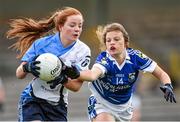 12 April 2014; Áine Hamill, St Ciaran's, in action against Róisín Howard, Colaiste Dun lascaigh. Tesco HomeGrown Post Primary School Junior A, St Ciaran's, Ballygawley, Co. Tyrone v Colaiste Dun lascaigh, Cahir, Co. Tipperary. Cusack Park, Mullingar, Co. Westmeath. Photo by Sportsfile