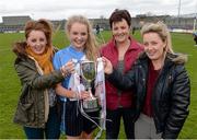 12 April 2014; St Ciaran's captain Eimear McAnespie with her sisters and current Monaghan players, Aoife, left, and Ciara, and her mother and former Monaghan player Brenda McAnespie. Tesco HomeGrown Post Primary School Junior A, St Ciaran's, Ballygawley, Co. Tyrone v Colaiste Dun lascaigh, Cahir, Co. Tipperary. Cusack Park, Mullingar, Co. Westmeath. Photo by Sportsfile