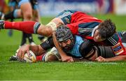 12 April 2014;Glasgow Warriors's Josh Strauss scores his side's third try despite the efforts of Munster's Donncha O'Callaghan. Celtic League 2013/14 Round 19, Munster v Glasgow Warriors, Thomond Park, Limerick. Picture credit: Diarmuid Greene / SPORTSFILE