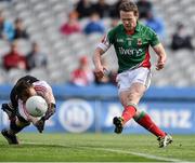 13 April 2014; Andy Moran, Mayo, beats, Derry goalkeeper Thomas Mallon to score his side's first goal. Allianz Football League Division 1 Semi-Final, Derry v Mayo, Croke Park, Dublin. Picture credit: David Maher / SPORTSFILE
