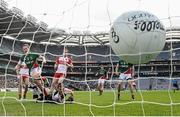 13 April 2014; Andy Moran, Mayo, beats Derry goalkeeper Thomas Mallon to score his side's first goal. Allianz Football League Division 1 Semi-Final, Derry v Mayo, Croke Park, Dublin. Picture credit: David Maher / SPORTSFILE