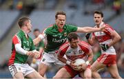 13 April 2014; Patsy Bradley, Derry, in action against Mickey Sweeney, left, and Andy Moran, Mayo. Allianz Football League Division 1 Semi-Final, Derry v Mayo, Croke Park, Dublin. Picture credit: Ray McManus / SPORTSFILE