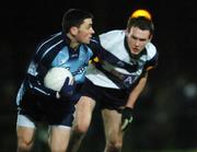 11 January 2006; Alan Brogan, Dublin, is tackled by James Sherry, UCD. O'Byrne Cup, First Round, Dublin v UCD, O'Toole's GAA Club, Ayrefield Park, Coolock, Dublin. Picture credit: David Levingstone / SPORTSFILE