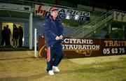 12 January 2006; Head coach Declan Kidney arrives for the Munster squad's kicking practice. Stade Pierre Antoine, Castres, France. Picture credit: Brendan Moran / SPORTSFILE