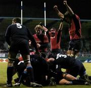 13 January 2006; Munster players Jerry Flannery, left, Anthony Foley, centre, and Donncha O'Callaghan celebrate after their sides try against Castres Olympique, scored by Marcus Horan. Heineken Cup 2005-2006, Pool 1, Round 5, Castres Olympique v Munster, Stade Pierre Antoine, Castres, France. Picture credit: Brendan Moran / SPORTSFILE