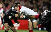 13 January 2006; Kevin Maggs, Ulster, is tackled by Dimitri Yachvilli and Benoit Lecouls, Biarritz Olympique. Heineken Cup 2005-2006, Pool 4, Round 5, Ulster v Biarritz Olympique, Ravenhill, Belfast. Picture credit: Oliver McVeigh / SPORTSFILE