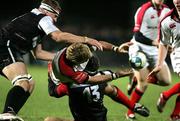 13 January 2006; Rodger Wilson, Ulster, is tackled by Philippe Bidabe, Biarritz Olympique. Heineken Cup 2005-2006, Pool 4, Round 5, Ulster v Biarritz Olympique, Ravenhill, Belfast. Picture credit: Oliver McVeigh / SPORTSFILE