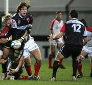 13 January 2006; Biarritz Olympiques Jean Baptiste Gobelet gets a pass to Frederico Martin. Heineken Cup 2005-2006, Pool 4, Round 5, Ulster v Biarritz Olympique, Ravenhill, Belfast. Picture credit: Oliver McVeigh / SPORTSFILE