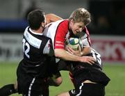 13 January 2006; Paul Steinmetz, Ulster, is tackled by Federico Martin and Phillippe Bidabe, Biarritz Olympique. Heineken Cup 2005-2006, Pool 4, Round 5, Ulster v Biarritz Olympique, Ravenhill, Belfast. Picture credit: Oliver McVeigh / SPORTSFILE
