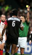 13 January 2006; Biarritz Olympiques theirry Dusautoir gets a yellow card from referee Dave Pearson. Heineken Cup 2005-2006, Pool 4, Round 5, Ulster v Biarritz Olympique, Ravenhill, Belfast. Picture credit: Oliver McVeigh / SPORTSFILE