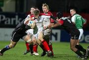 13 January 2006; Andrew Trimble, Ulster, is tackled by theirry Dusautoir and David Couzinet, Biarritz Olympique. Heineken Cup 2005-2006, Pool 4, Round 5, Ulster v Biarritz Olympique, Ravenhill, Belfast. Picture credit: Oliver McVeigh / SPORTSFILE